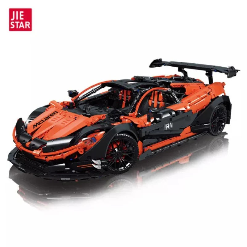 Orange and black sports car model made of interlocking bricks on a white background with 'JIE STAR' branding.