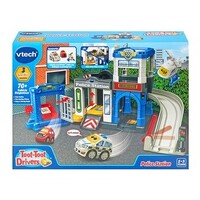 Vtech toy set packaging with colorful design and toy cars on a blue background