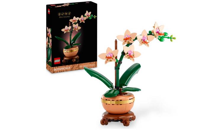 LEGO model of an orchid plant with a matching packaging box on a white background