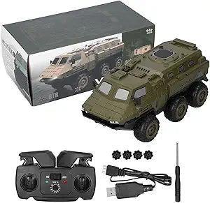 Green RC armored vehicle with controller and accessories in front of packaging
