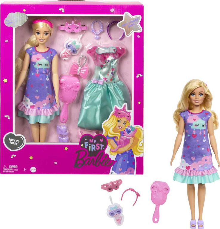 Barbie doll with outfit and accessories in packaging on a white background