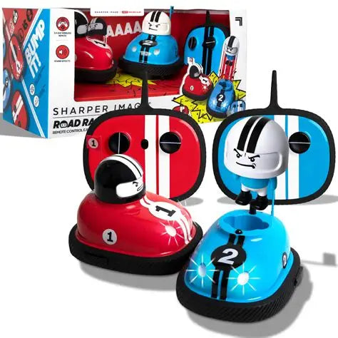 Two remote-controlled bumper cars with a Sharper Image box in the background.