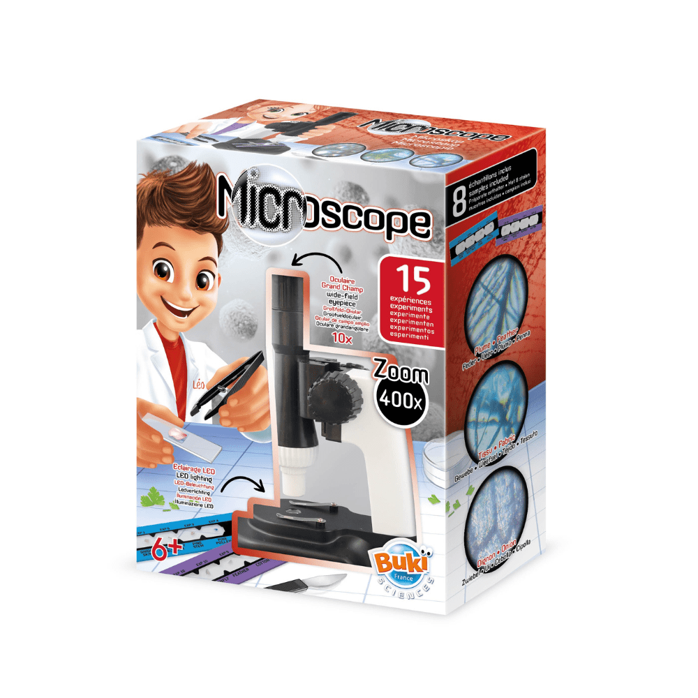Box of a toy microscope with a child scientist illustration on a white background